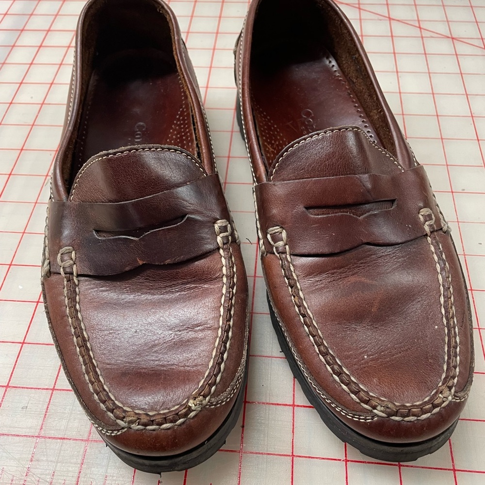 Cole Haan brown leather contrast stitched penny loafers.